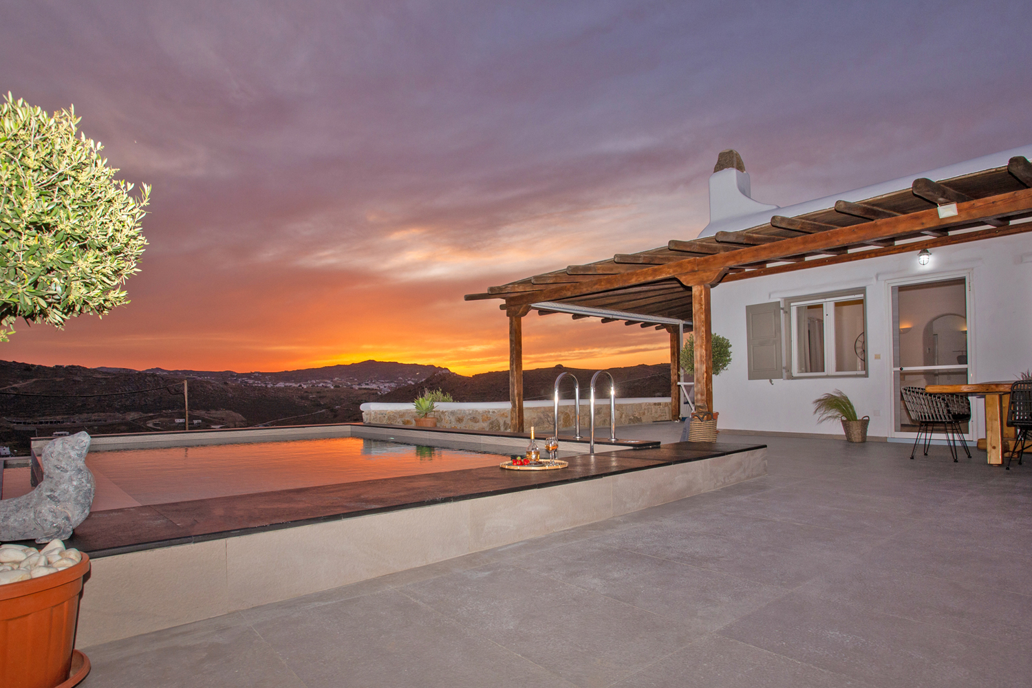 kalo livadi View villas pool at sundown